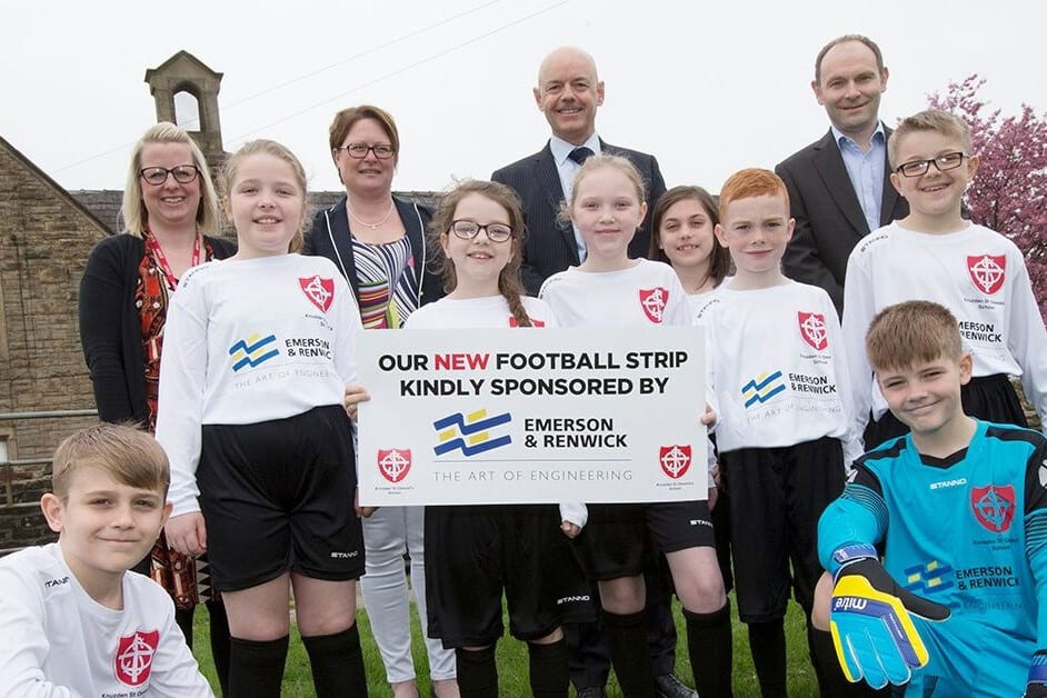 School children from Knuzden St. Oswald's say thanks for new kit